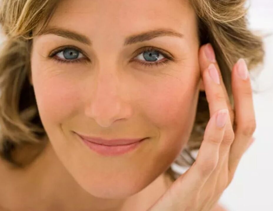 beautiful woman renews facial skin